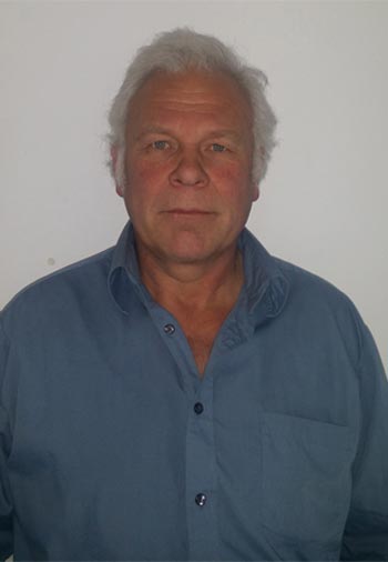 En bild på Jan Carlsson i blå skjorta. 